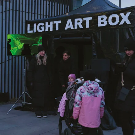 The Light Art Box tent at an outdoor event